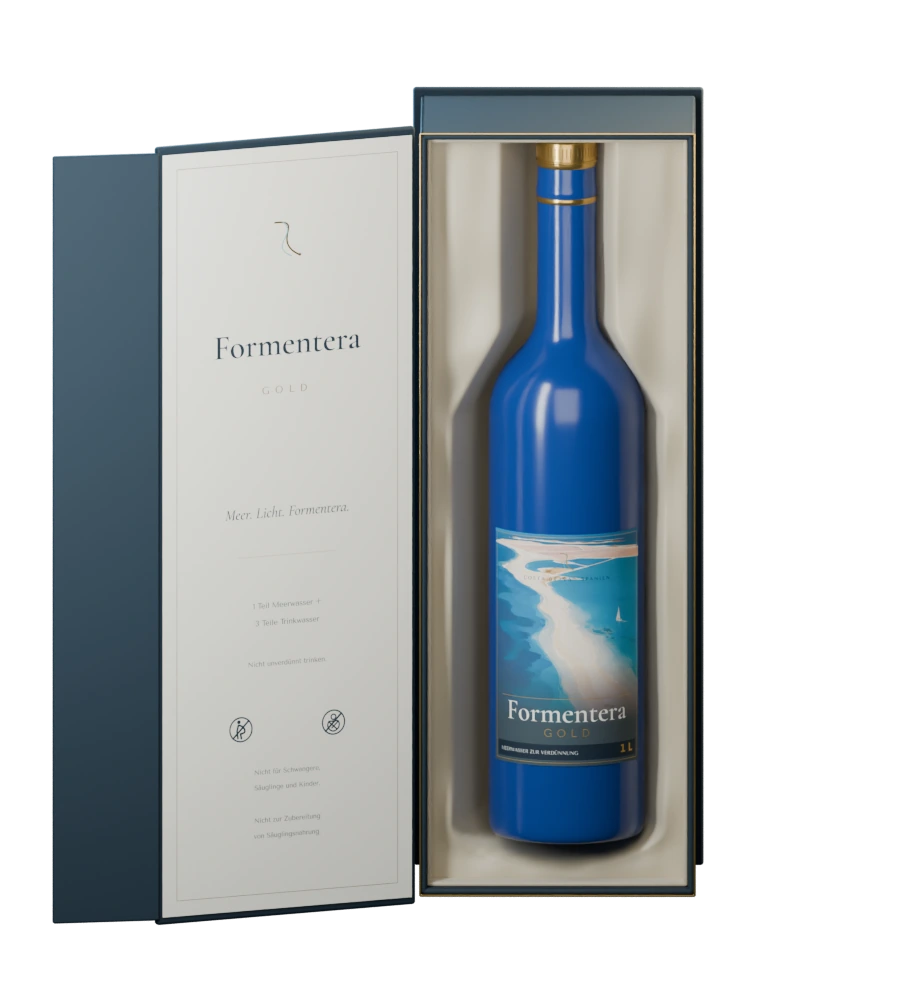 Formentera Gold: unsere blaue Flasche mit goldenem Verschluss in der geöffneten Originalverpackung